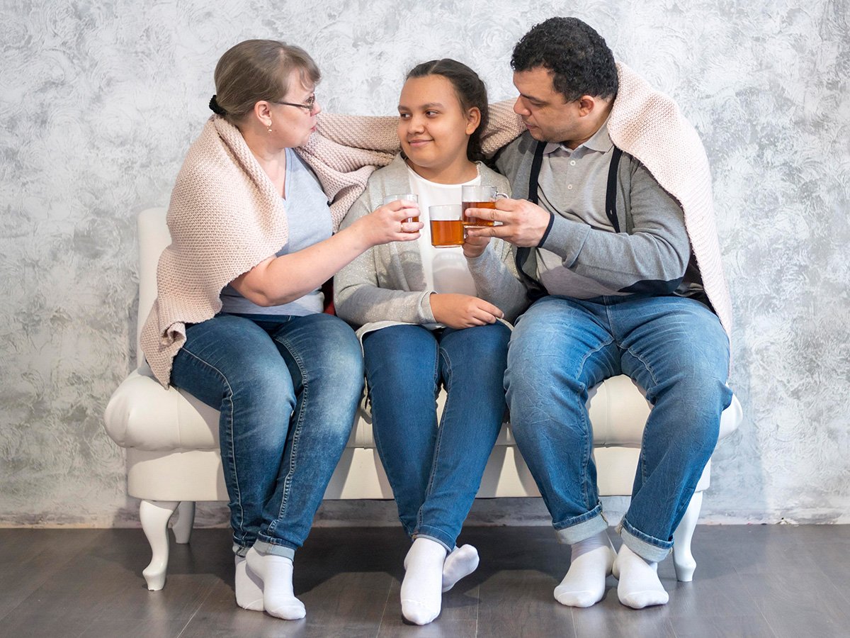 multicultural family enjoying tea